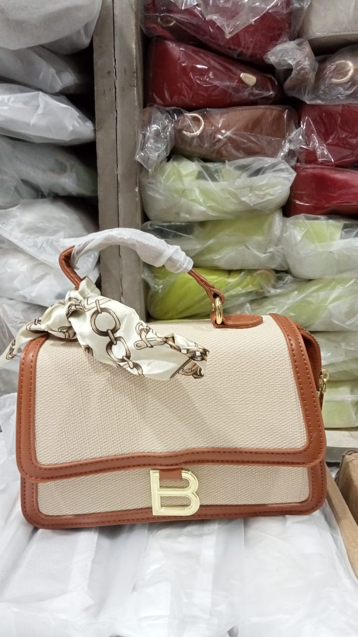 Versatile beige and brown crossbody handbag with premium faux leather details - Neelo Fashion Pakistan