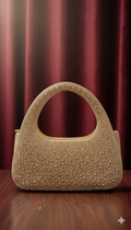Sparkling crystal shoulder bag in golden finish for parties
